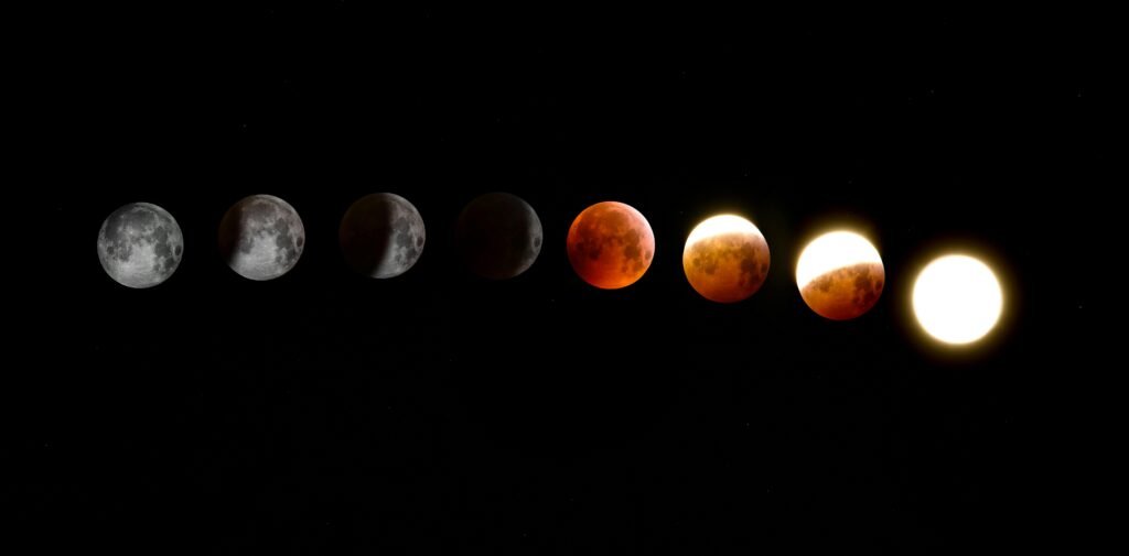 A sequence of eight images showing the phases of a lunar eclipse, transitioning from a full moon to a total eclipse and back to full illumination. Harvest Supermoon Eclipse