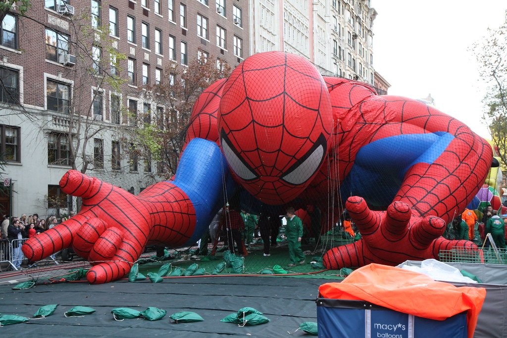 Giant Spider-Man balloon tethered to the ground before Macy's Thanksgiving Day Parade