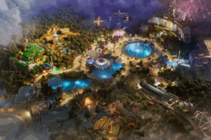 Aerial view of Universal Orlando's Epic Universe at night, showcasing the vibrant themed lands and attractions.