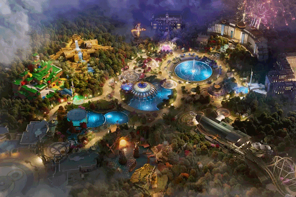 Aerial view of Universal Orlando's Epic Universe at night, showcasing the vibrant themed lands and attractions.